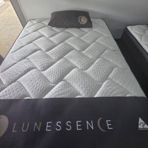 Pillow top mattress with quilted cover and Lunessence branding on display in the Top End Mattress Darwin showroom